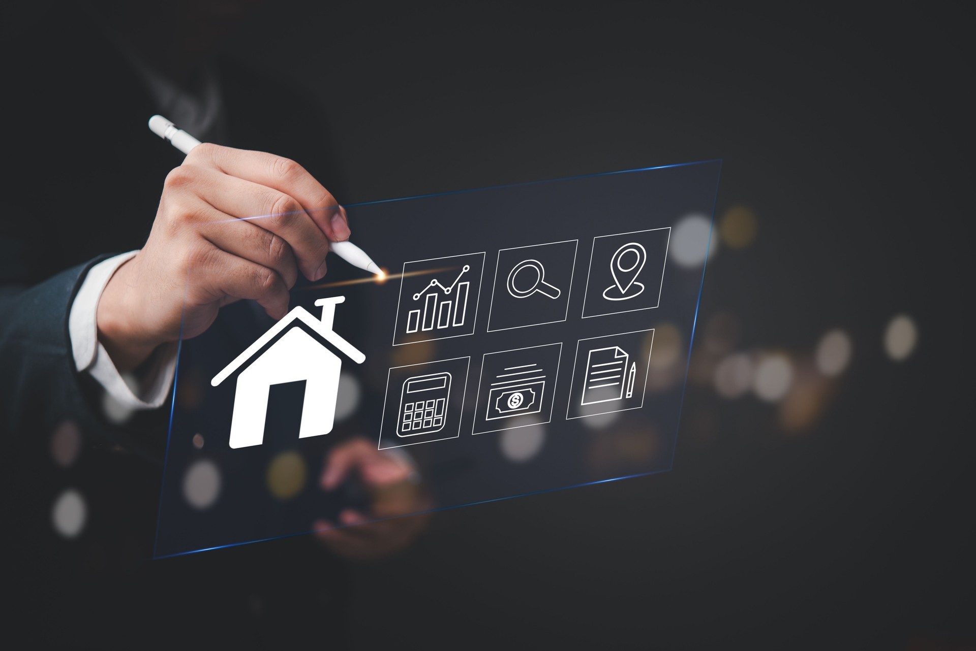 Modern digital interface showing real estate elements with businessman hand pointing stylus pen at house icon virtual screen financial analysis dashboard property technology